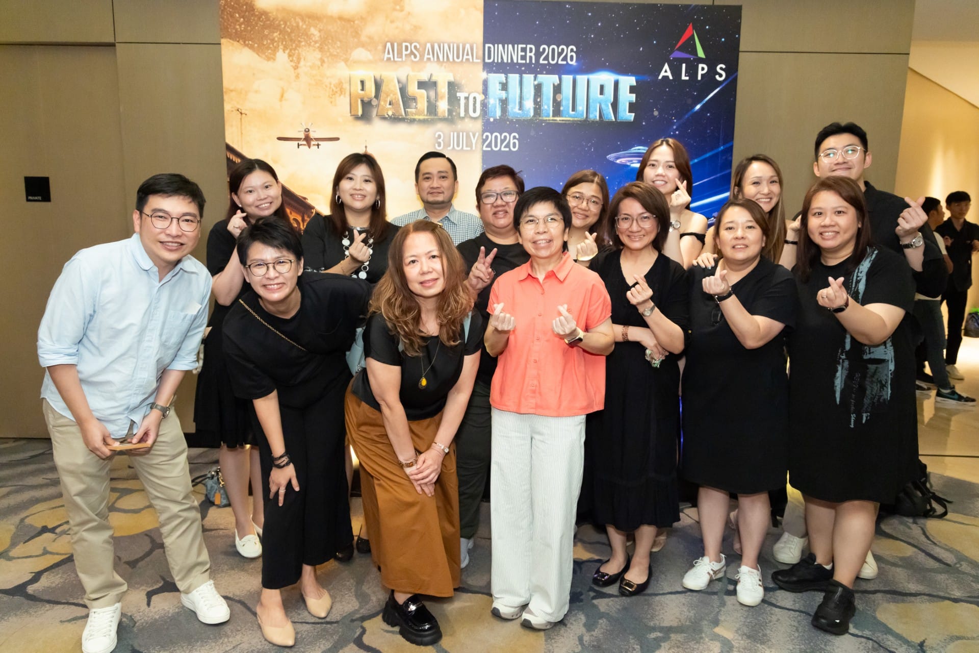 Photo of 15 ALPS staff taken at ALPS Anniversary Dinner